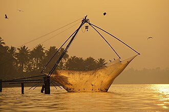 A Chinese fishing net being raised in Kochi. Fishing contributes 1.07% to India's total GDP, and supports over 28 million people, especially within vulnerable communities.