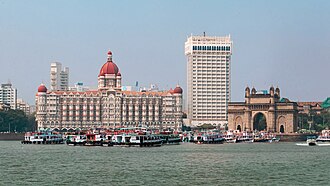 Mumbai is India's largest urban agglomeration. Shown here are the Taj Mahal Palace Hotel to the left and the Gateway of India.